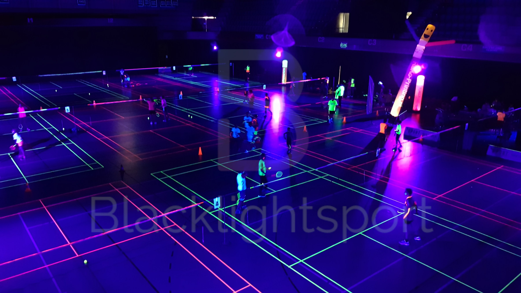 Blacklight badminton glow in the dark